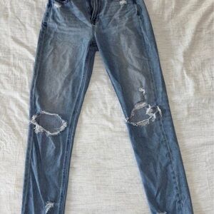 Women's Distressed Blue Jeans